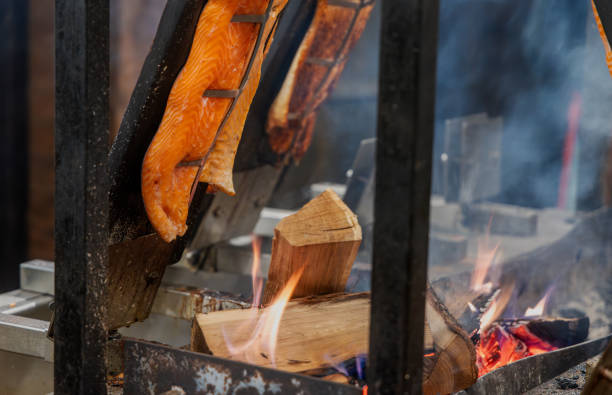 Traditional Flame-Cooked Salmon with Rustic Charm – A Nordic Culinary Heritage