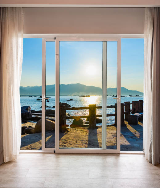 istock Window with a view of the ocean and mountains 2191475394