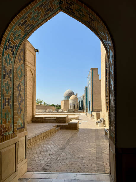 istock Historic Courtyard with Mosaic Arch and Dome under Blue Sky 2191478291