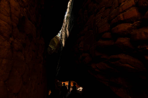 The Naga Cave in Bueng Kan, Thailand, features serpent-like rock formations tied to Naga mythology, attracting visitors to Phu Langka National Park for nature and spirituality
