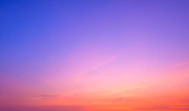 istock Evening sky background with colorful pink orange natural gradient light and thin cloud on blue romantic twilight sky after sundown 2191481388
