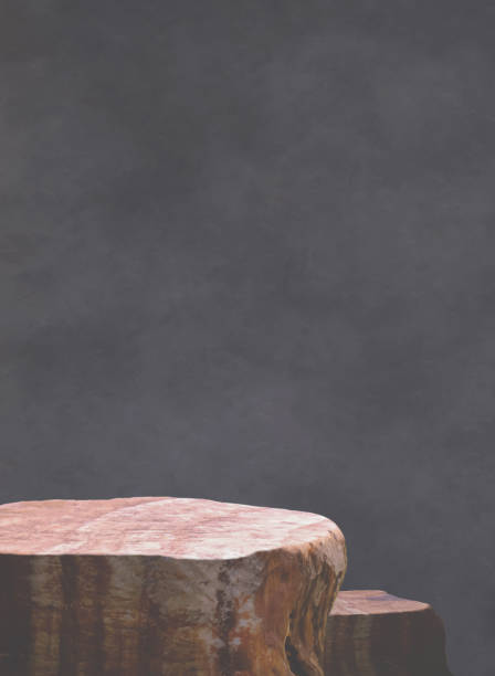 istock Rock stone podium stand on dark gray concrete loft interior wall background with copy space, Product mockup stage display vertical presentation in vintage style backdrop 2191481418