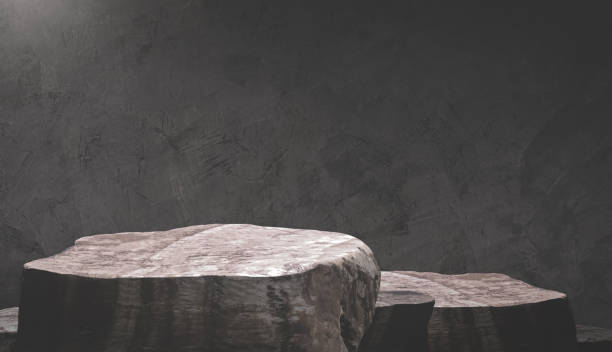 istock Background mockup display presentation vintage design. Stone rock podium stage with interior dark concrete loft wall and studio lighting, Monochrome template product promotion stand backdrop 2191481419