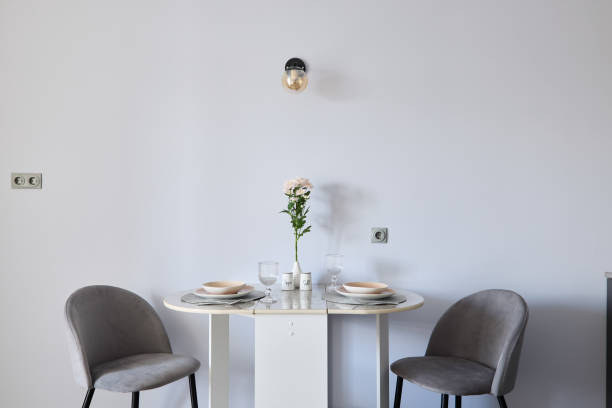 istock A modern minimalist dining table set featuring a charming floral centerpiece for decor 2191482964
