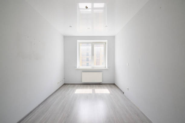 istock An empty modern room featuring abundant natural light and a minimalist design aesthetic 2191483215