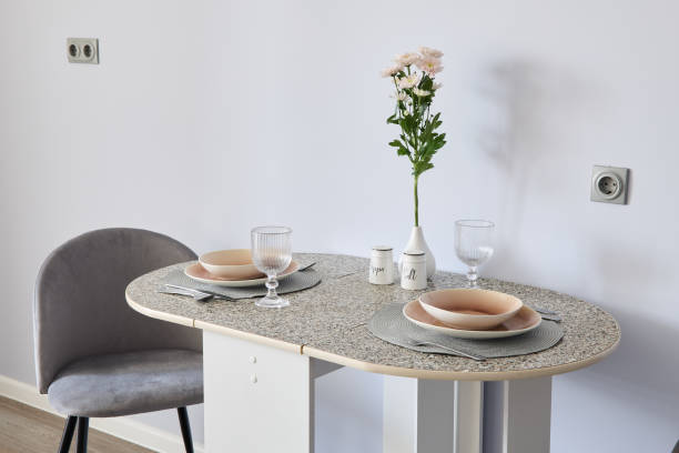 istock An Elegant Dining Setup Featuring Beautiful Decorative Flowers on a Modern Table Design 2191483916
