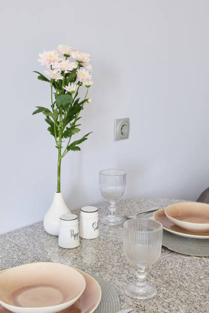 istock An Elegant Dining Setup Featuring a Beautiful Floral Centerpiece and Stunning Tableware 2191484102