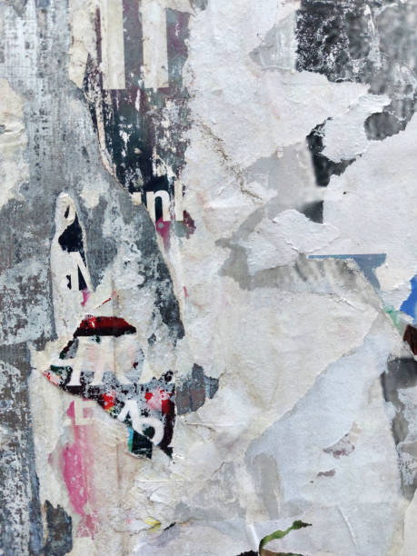 istock Torn and ripped and street poster background, weathered old paper collage backdrop 2191484637