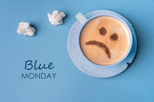 istock Blue Monday. Unhappy coffee with sad face 2191487149