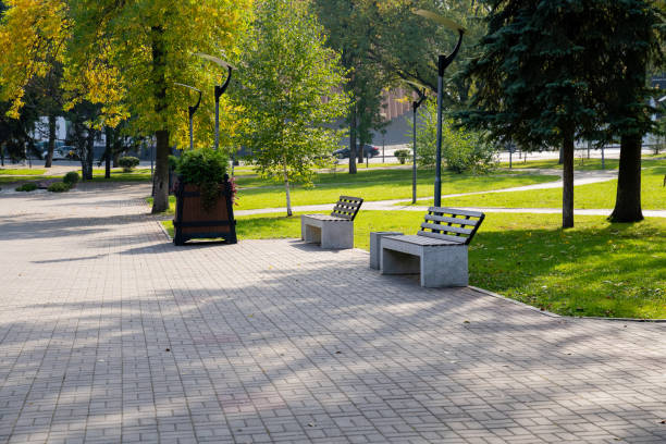 istock A winding path in a serene park with inviting benches and vibrant greenery offers a perfect escape for relaxation and leisurely strolls 2191487375