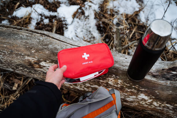 istock An essential first aid kit is placed on a rustic log surrounded by a picturesque winter landscape, evoking feelings of warmth and preparedness for any unexpected situation 2191489586