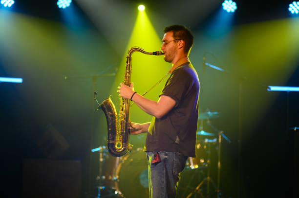 istock Saxophonist performing live on stage with passion and skill 2191490164