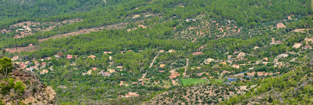 One of many small hidden villages in Serra de Tramuntana, Mallorca, Spain.  In 2011, UNESCO World Heritage Site status was awarded to Mallorcaâs magnificent Serra de Tramuntana. This impressive mountain range â almost 90km long â forms the backbone of Mallorca, and stretches from Andratx in the southwest to the Cap de Formentor in the far north of the island.