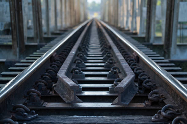 istock Railway Tracks on Steel Bridge Perspective 2191492098