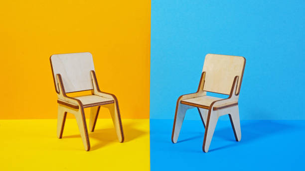 istock Negotiation Strategies, Job interview and Hiring Process. Difficult conversation. Two chairs stand opposite each other 2191492377