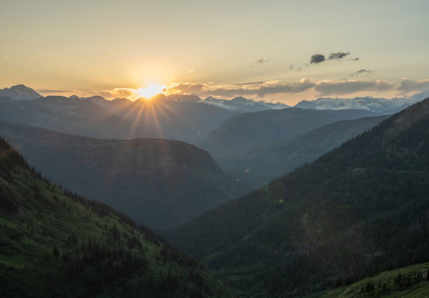 istock Sunburst Over The Ridge Of The Continental Divide In Glacier 2191492538