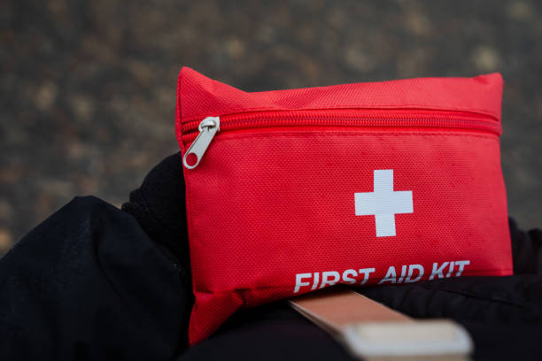 istock A bright red first aid kit, prominently marked with a white cross, clearly signifies its vital medical purpose, containing essential supplies for health care and safety during emergencies 2191492871
