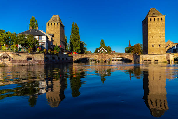 Strasbourg, France - circa September, 2018: Medieval architectural ensemble known as Covered Bridges is featured in Petit France, historic district of Strasbourg, France
