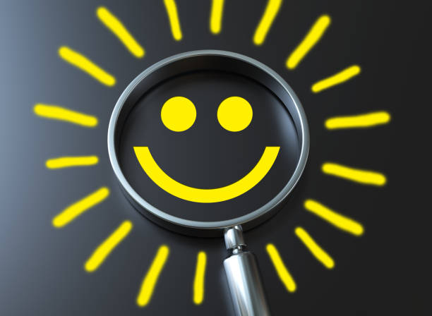 istock Magnifier focus to smile face emoticon with light bulb smart idea, creativity and solution concept. 2191497535