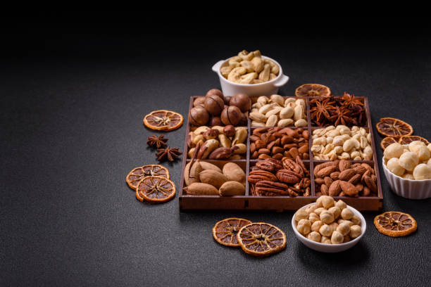 istock Box with various nuts cashew, macadamia, peanut, cedar, pecan, walnut, brazil, hazelnut 2191498805