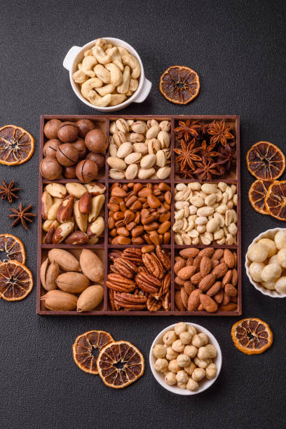 istock Box with various nuts cashew, macadamia, peanut, cedar, pecan, walnut, brazil, hazelnut 2191498806