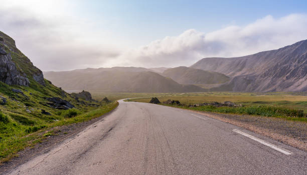 istock Summer road in mountains, Berlevag, Norway 2191502554