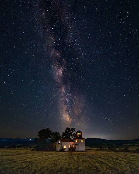 istock Milky Way in a field with a small church 2191503884