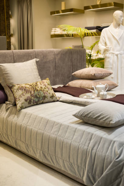 Home bedroom interior with soft bed and pillows