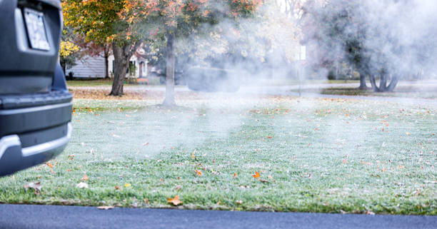istock Exhaust Pipe Smoke From a Stationary ICE Car 2191510283