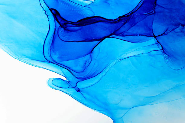istock Vibrant blue alcohol ink flowing smoothly on a white canvas in an artistic blend 2191516755