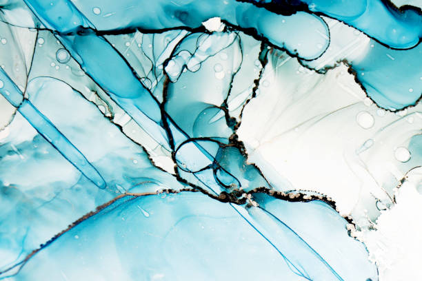 istock Exploration of vibrant blue alcohol ink abstract art on a smooth surface 2191516759