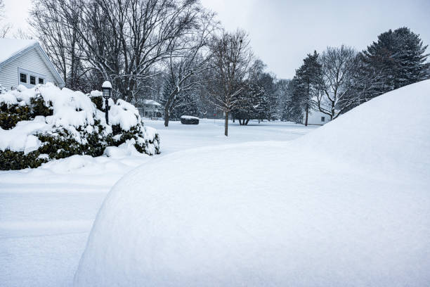 istock Car Parked on Driveway Buried in Deep Snow 2191521122
