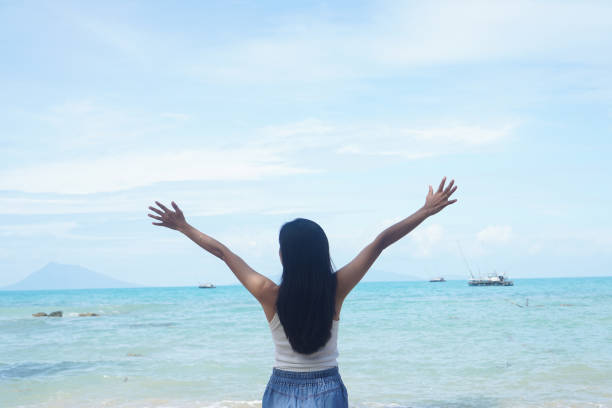 Woman feel free in beach