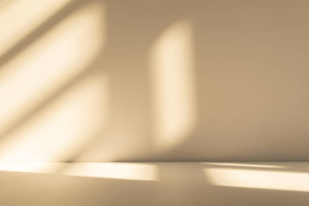 istock Studio style background wall decoration presentation uses white and beige tones. with shadows cast from a nearby window, concept creating a decorative 2191530288