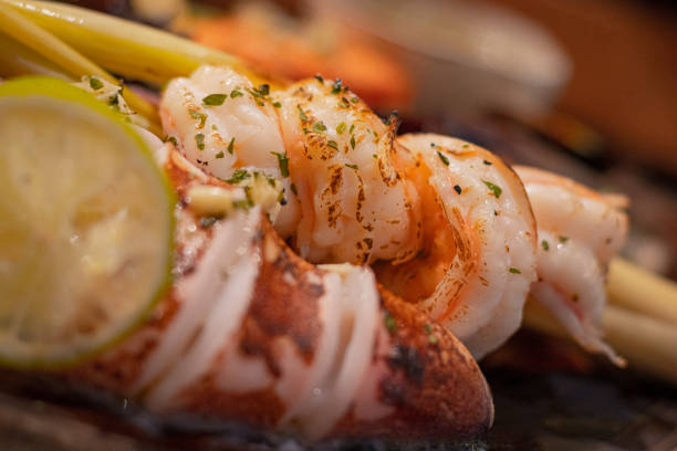 istock Close up, Grilled squid with herbs on wooden slab 2191530615