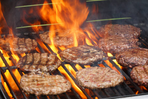 istock barbecue grill cooking burger steak on the fire 2191533544