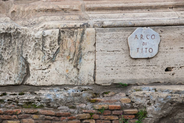 Plaque on Triumphal Arch of Titus in Roman Forum, Italy. It was constructed in the 1st century AD by the Roman Emperor Domitian to commemorate Titus' victories, including the siege of Jerusalem in 70 AD.