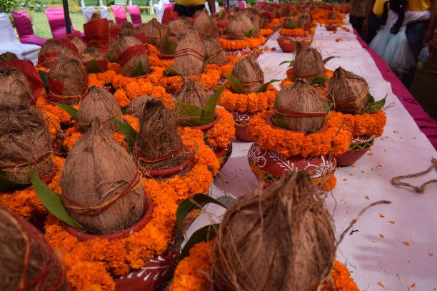 istock Kalash with coconut and mango leaf with floral decoration earthen pots containing sacred water. Kalash for hindu puja during Jagannath Temple Mangal Kalash Yatra, front view, closeup 2191539252