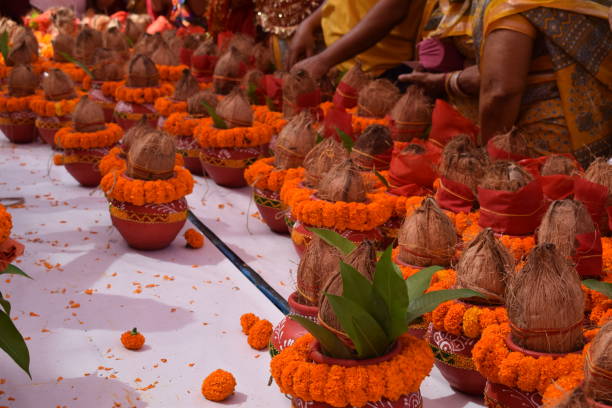 istock Kalash with coconut and mango leaf with floral decoration earthen pots containing sacred water. Kalash for hindu puja during Jagannath Temple Mangal Kalash Yatra, front view, closeup 2191539257