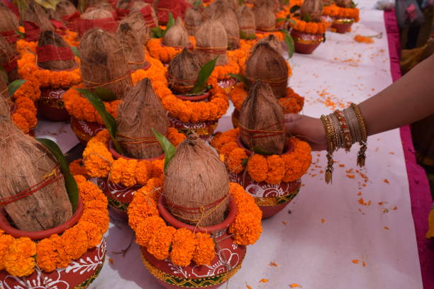 istock Kalash with coconut and mango leaf with floral decoration earthen pots containing sacred water. Kalash for hindu puja during Jagannath Temple Mangal Kalash Yatra, front view, closeup 2191539308
