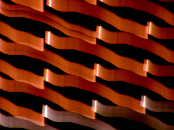 Dynamic Play of Light and Shadow Reveals Abstract Forms in Vibrant Hues