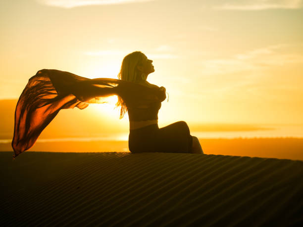 istock Serene Moroccan Beach Sunset with Caucasian Girl 2191543032