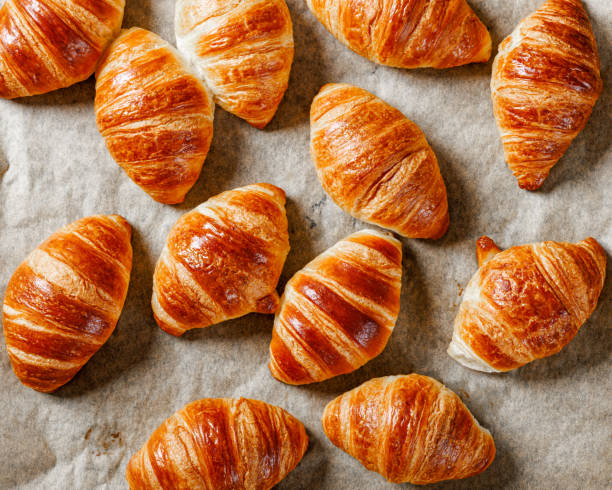 istock freshly baked in oven croissants on a sheet pan 2191544463