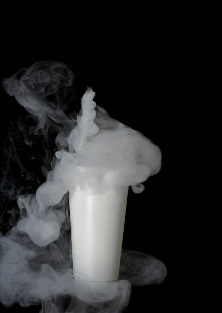 istock White reusable cup and straw with mist and smoke swirling around creating unique patterns 2191546882