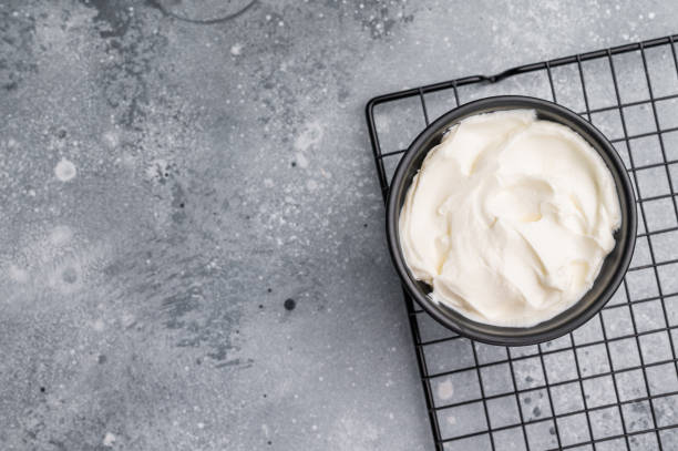 istock Healthy Fresh greek yogurt in a bowl. grey background. top view 2191547444