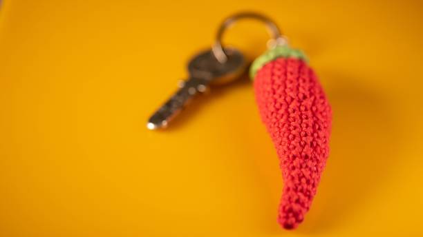 istock Red chile crochet keychain with hanging key 2191548940