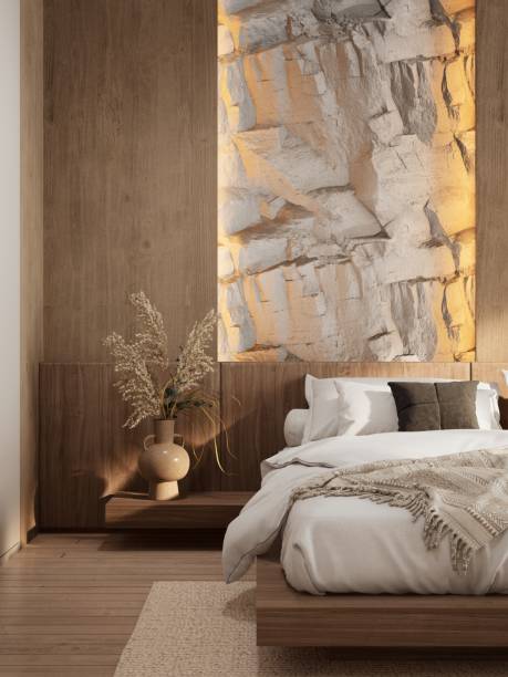istock A modern bedroom featuring a textured wall, natural wood elements, cozy bedding, and minimalistic decor, creating a serene and inviting atmosphere. 3d rendering. 2191549080
