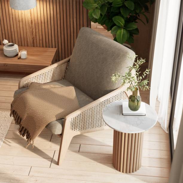 istock A cozy, modern living space featuring a stylish chair, decorative throw, and a minimalist side table adorned with a plant and natural light. 3d remdering interior. 2191549095