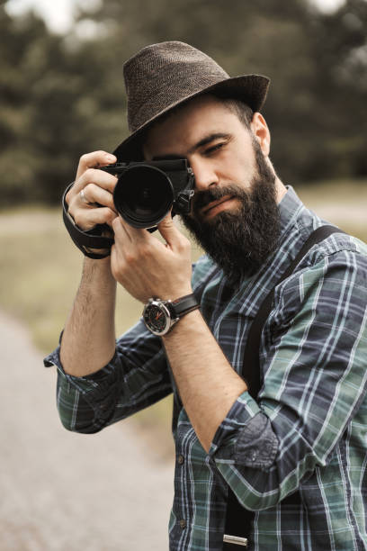 istock A young man with a beard poses with the camera. 2191550200