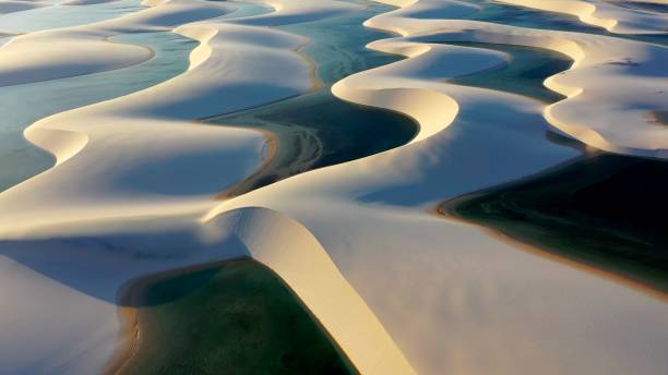 Lencois Maranhenses Skyline At Barreirinhas In Maranhao Brazil Northeastern. Lencois Maranhenses Skyline At Barreirinhas In Maranhao Brazil. Freshwater Lakes Landscape. Dunes Scenery. Lencois Maranhenses Skyline At Maranhao. Tourism Travel. Nature Seascape. Beach Background. brazil desert maranhao state national park stock pictures, royalty-free photos & images